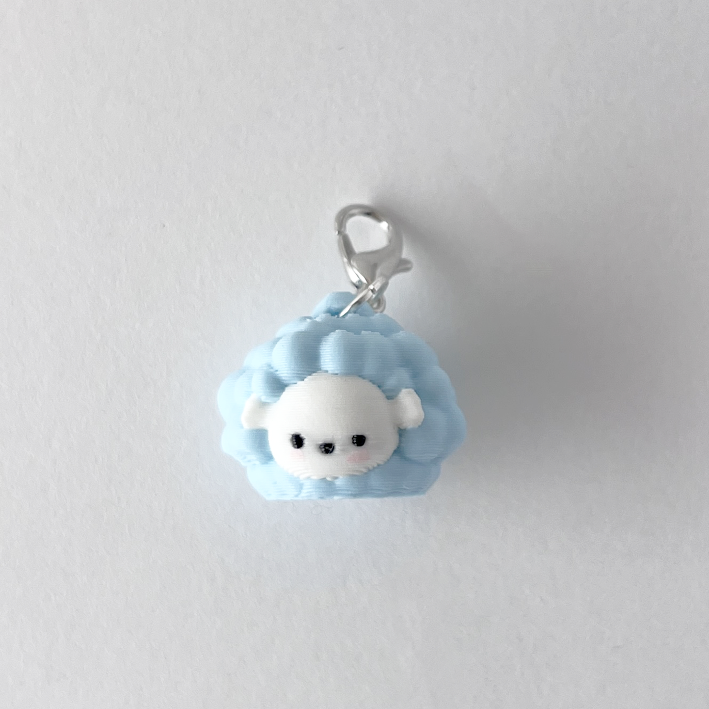 mini charm nubeja
