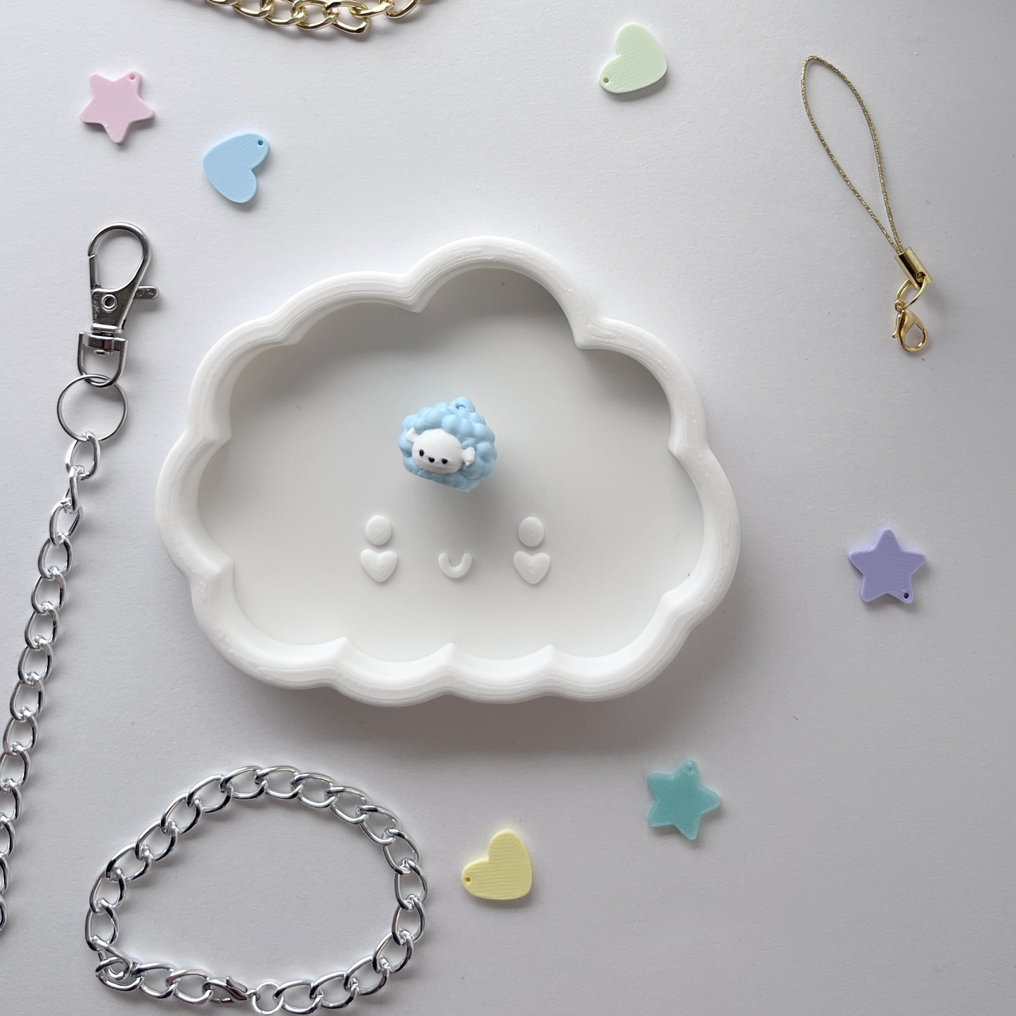 mini charm nubeja