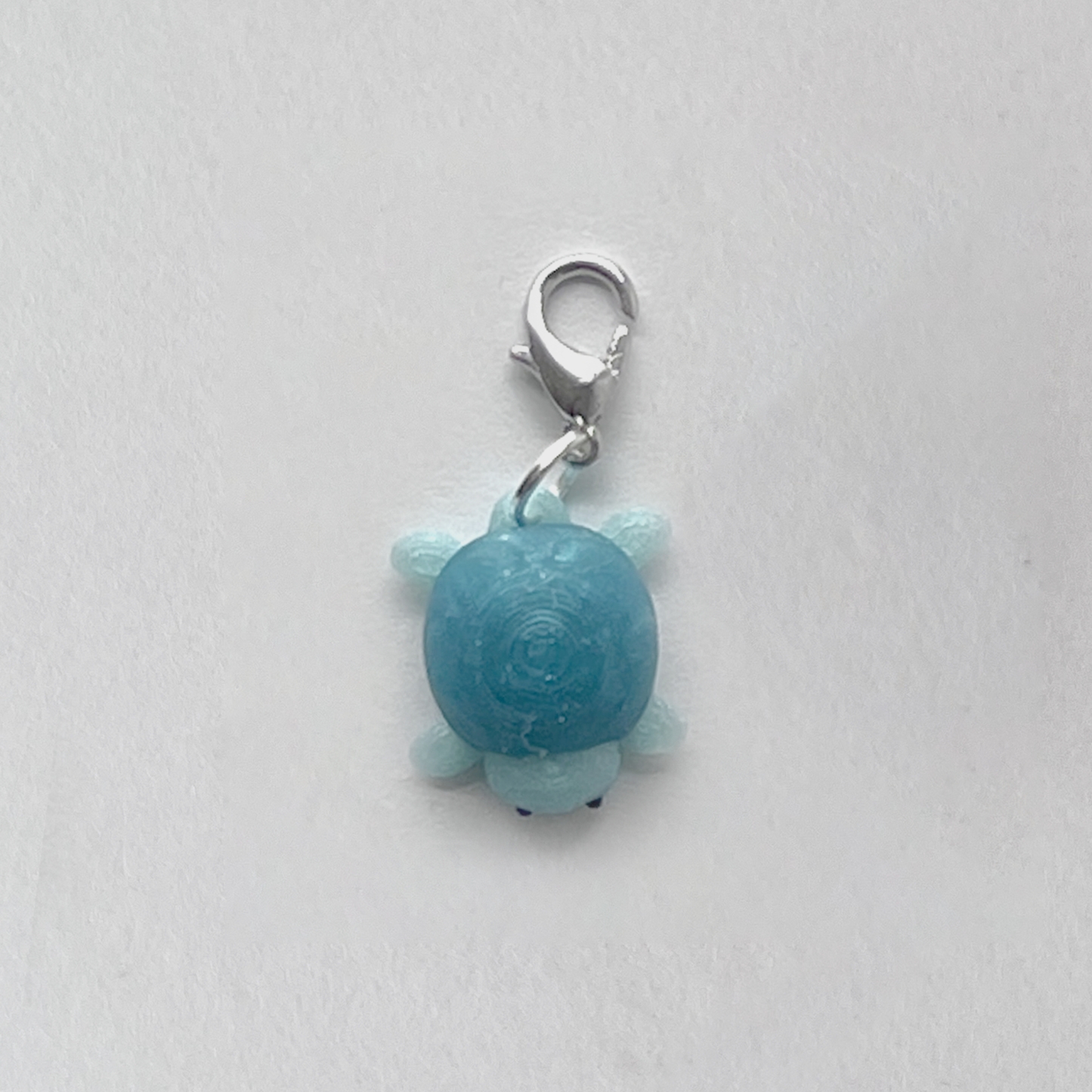 mini charm tortuga